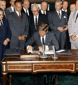Kennedy Signs Partial Nuclear Test Ban Treaty